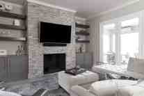 Family room custom built-ins and fireplace interior design by ML Interiors Group in Dallas, TX