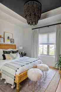 Bedroom design with natural light and natural textures by ML Interiors Group in Frisco, TX