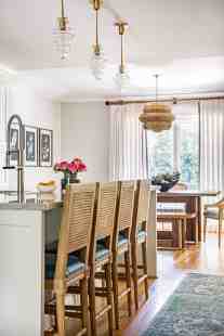 Kitchen island lighting interior design by ML Interiors Group in Dallas, TX