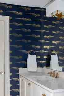 Boy's bathroom design using mixed metal hardware by ML Interiors Group in Dallas, TX