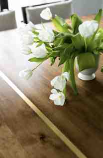 This handcrafted custom dining table with brass inlay was well worth the wait.