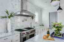 Stove and vent close-up kitchen interior design by ML Interiors Group in Dallas, TX