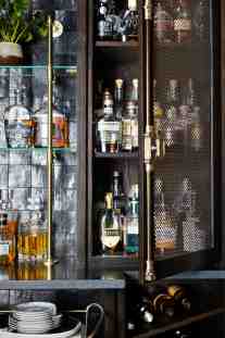 Whiskey room bar close-up interior design by ML Interiors Group in Keller, TX