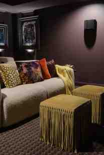 Movie night is cozy and comfortable with motion sofas and plenty of room for the entire family.