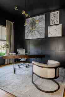 Dark dramatic home office designed by ML Interiors Group in Dallas, TX